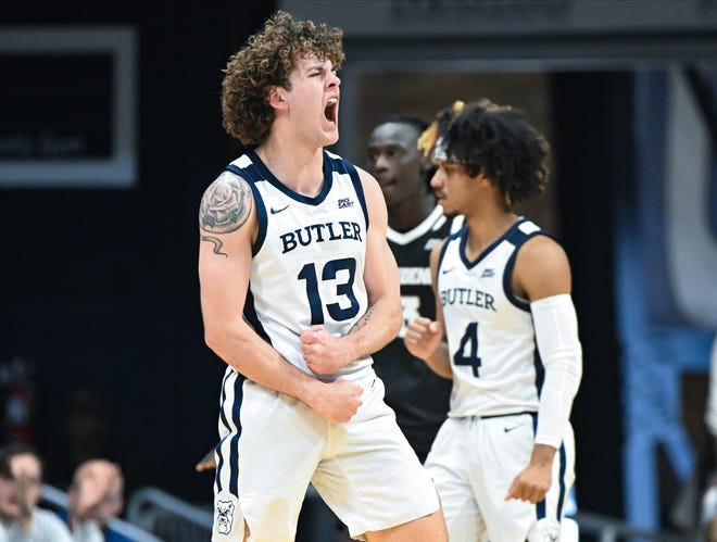 Feb 10, 2024; Indianapolis, Indiana, USA; Butler Bulldogs guard Finley Bizjack (13) celebrates after forcing a turnover against the Providence Friars during the first half at Hinkle Fieldhouse. Mandatory Credit: Robert Goddin-USA TODAY Sports