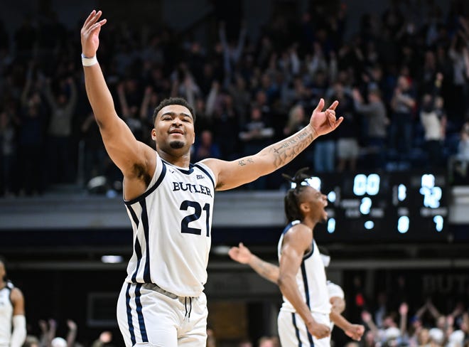 Feb 10, 2024; Indianapolis, Indiana, USA; Butler Bulldogs guard Pierre Brooks (21) and Butler Bulldogs forward Augusto Cassia (0) celebrate after defeating the Providence Friars at Hinkle Fieldhouse. Mandatory Credit: Robert Goddin-USA TODAY Sports