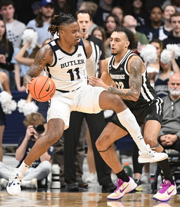 Feb 10, 2024; Indianapolis, Indiana, USA; Butler Bulldogs guard Jahmyl Telfort (11) goes to the basket against Providence Friars guard Devin Carter (22) during the second half at Hinkle Fieldhouse. Mandatory Credit: Robert Goddin-USA TODAY Sports